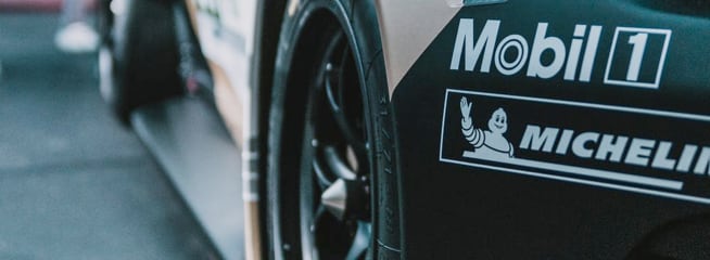 Closeup view of the side of a race car.